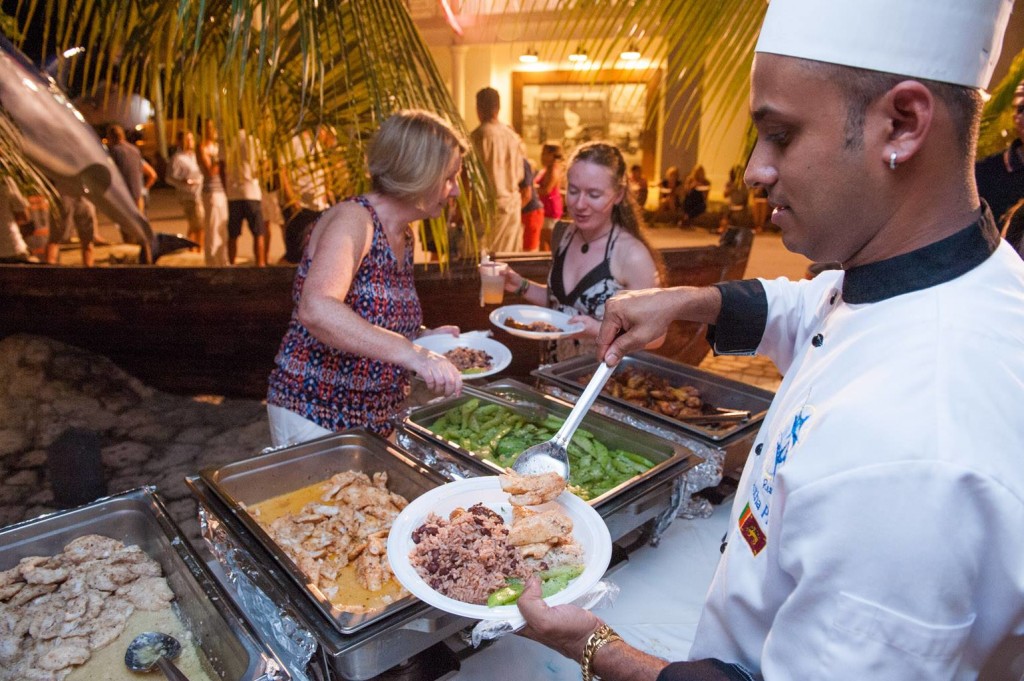 Lionfish and Caribbean staples were served in a tasty buffet at the street dance hosted by conservationist Guy Harvey. Photo courtesy Courtney Platt.