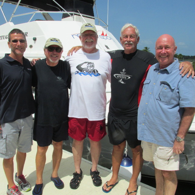 Welcoming the legends to the Cayman Islands (L-R) Red Sail Sports' Bill Edwards, Leslie Leaney, Dan Orr, Bill Acker and Rod McDowall.