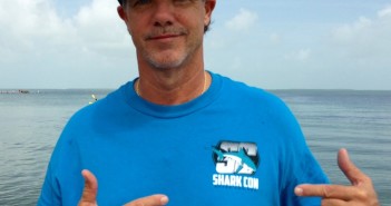 Which world famous marine artist will be appearing at Shark-Con? Wyland at The Scuba News