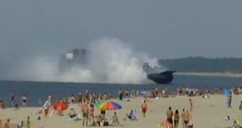 Russian military ship ploughs onto a crowded beach