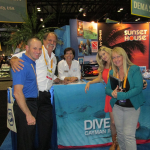 The busy Sunset House booth (L-R) Neil van Niekerk, Southern Cross Club Manager; Keith Sahm, Sunset House General Manager; Karin Sahm, Sunset House General Manager; Stephanie Quayle,