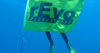 Share Your Very Own #ScubaSelfie Photos With Us Lee with the rEvo Flag