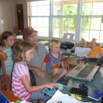 Project Grouper Moon is also a family affair at the home of Peter Hillenbrand, who is seen here with the Semmens children. Their parents Christy and Brice are project scientists. Photo courtesy of the Grouper Moon Project.