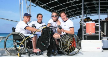 Aboard a spacious Red Sail Sports boat are from left to right Stay-Focused members: Brian Siemann, Jenn Poist, Gail Gaeng, and Tatyana McFadden. Brian and Gail are Stay-Focused mentors and will be in Grand Cayman again this summer diving