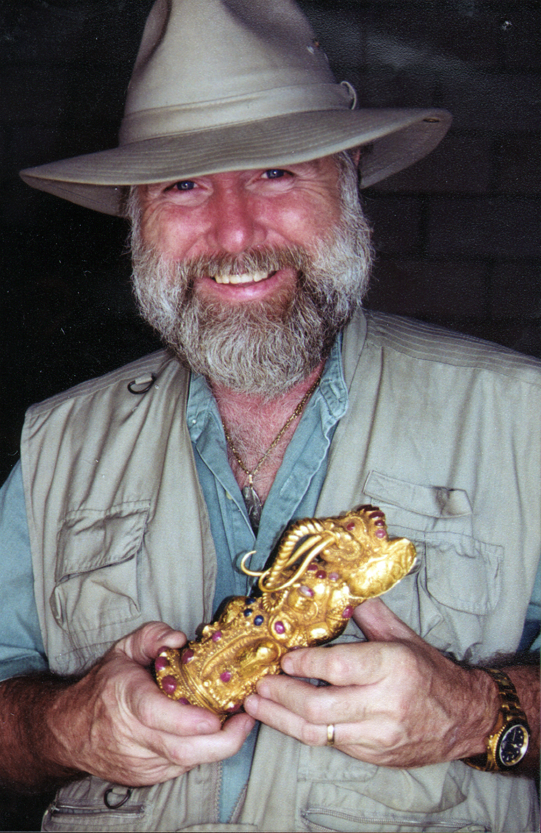 Dr E Lee Spence with gold sword handle