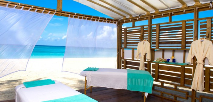 Dive in the morning and then pamper yourself with a spa treatment on the beach. Photo courtesy Westin Grand Cayman