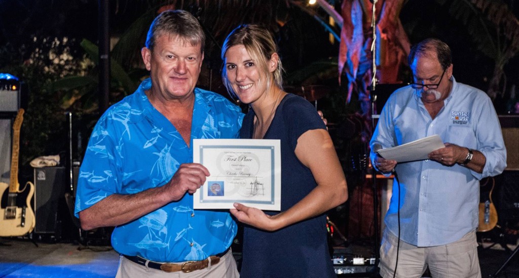 A photo contest will also be a big part of the Legends and lions celebration. Here Guy Harvey presents one of the winners with a prize. Photo courtesy Courtney Platt