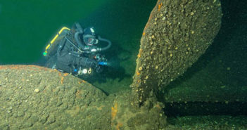 Diver at the propeller of the Keystorm, by Olga Torrey