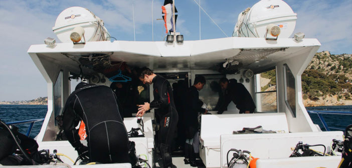 Divers In Boat