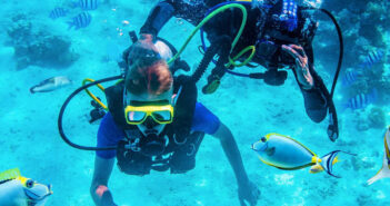 4 Reasons To Scuba Dive in Kauai, Hawaii Divers Underwater