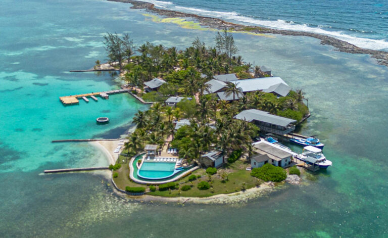 What If Your Dive Group Had the Entire Resort? Discovering a Different Side of Guanaja Clark's Cay Aerial
